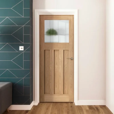 Oak 1930s DX three-panel internal door with obscure glass fitted in a home